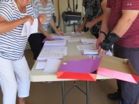 Work party stuffing annual meeting packets