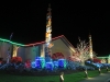 Casino Totem Pole With Seahawk Color Lighted Bushes Surrounding