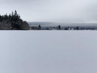 Snow storm coming in over the Strait of Juan de Fuca, seen looking toward Taylor Farm.